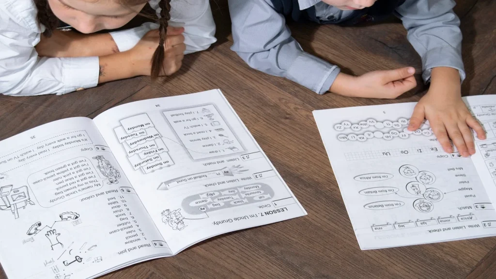 Collage showing different book illustration styles including children's book character, fantasy map, and non-fiction diagram